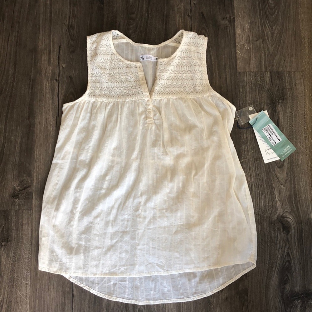 Carve cream sleeveless blouse
